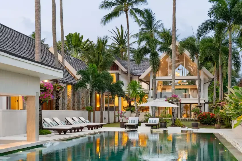 The swimming pool, tropical gardens and residence at Mandarin Beach Villa, Koh Samui